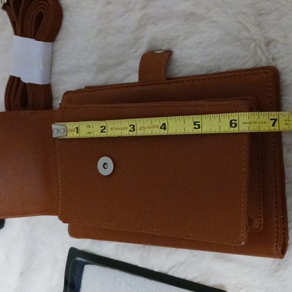 STG hand purse with shoulder strap and slip to put phone. Never used - Picture 10 of 12